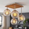 Lampa sufitowa Koyoto z drewnianymi lamelami i 4 kloszami nad stołem jadalnianym