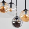 Lampa sufitowa Gastor z 4 szklanymi kloszami kulistymi nad stołem jadalnym